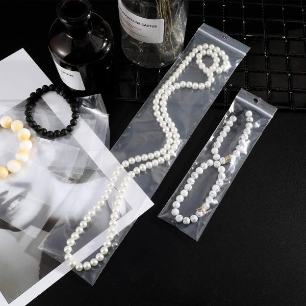 La tirette en plastique claire met en sac rescellable avec le trou de coup