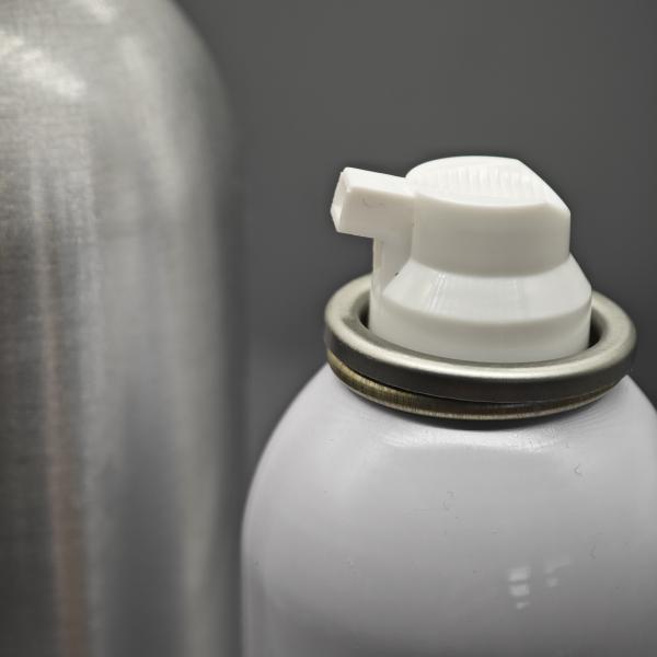 Compact Shaving foam valve for travel-sized grooming kits with leak-proof seal and easy operation