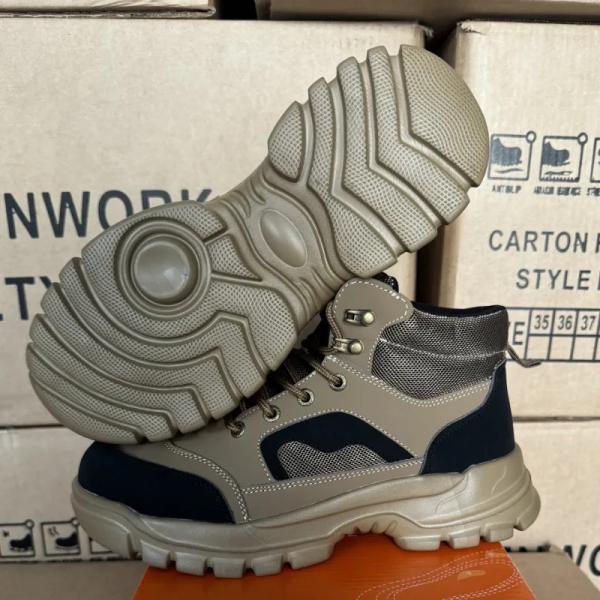 Botas de pie de acero de almacén unisex Botas de trabajo industriales antideslizantes