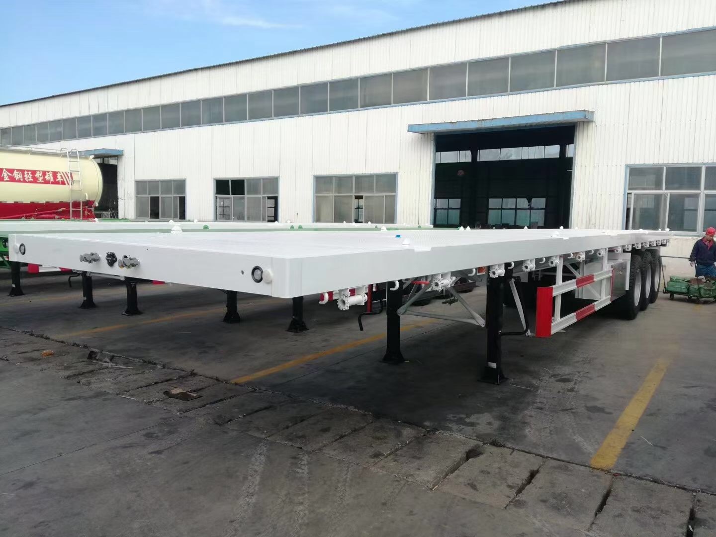 Container Flatbed Semi Trailer semi truck flatbed trailer featuring fifth wheel 90 designed for cargo transport and performance