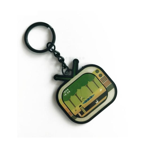 Сплав цинка формы ТВ ключевого кольца металла логотипа лазера мультфильма для подарков детей