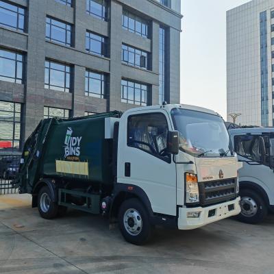 Sinotruck Howo Benne basculante droite Robuste Camion poubelle compacteur