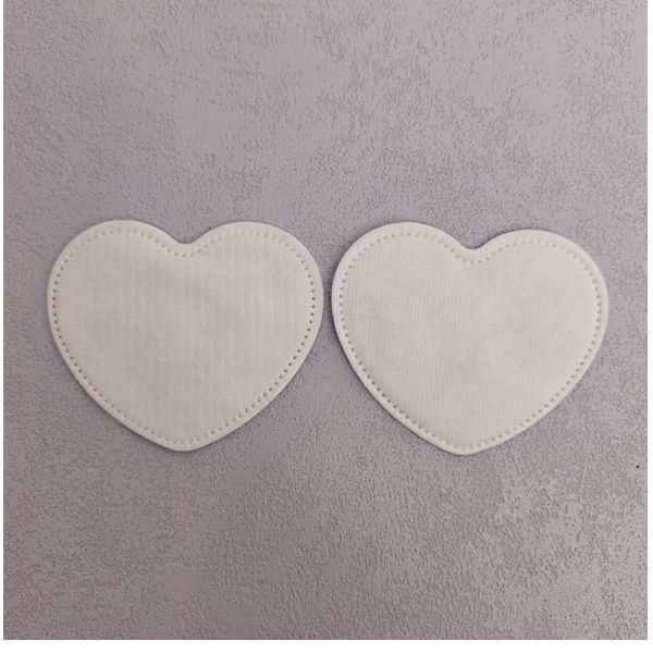 Discos de algodón desechables biodegradables en forma de corazón ecológicos OEM para desmaquillar
