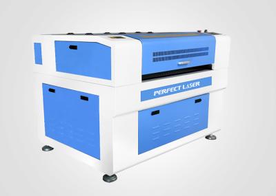 Máquina de corte e gravação a laser Co2 para madeira / vedação / placa de borracha