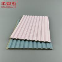 Panel de pared de wpc laminado de diseño moderno rosa para decoración de paredes en el hogar