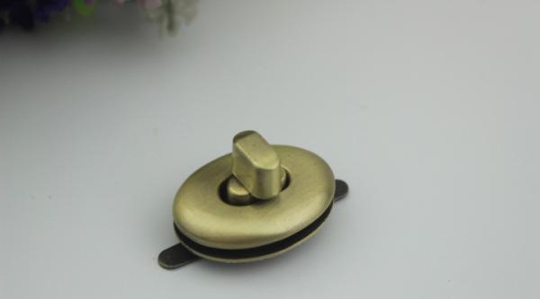 High quality small oval shape metal handbag accessories gold twist turn lock