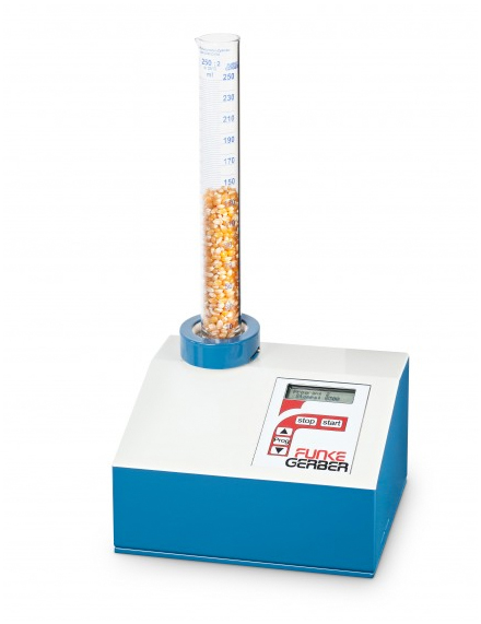 En secouant le volumètre déterminez dedans le volume ou la densité tassé des produits pulvérulents et granulaires