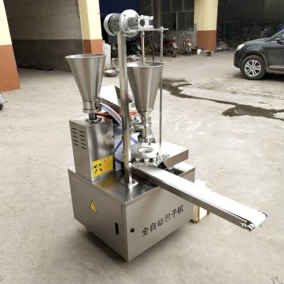 China automática completa cozinhou a máquina enchida do bolo com funil dobro