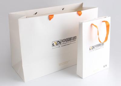 A embalagem de dobramento extravagante decorativa do presente ensaca o logotipo impressa para o equipamento da beleza