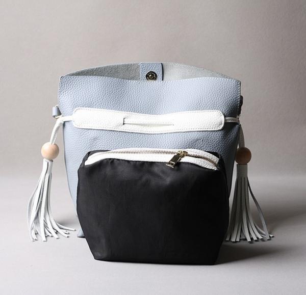 2016 summer new Korean fashion spell color tassel leather handbag drawstring shoulder bag packet header layer of skin