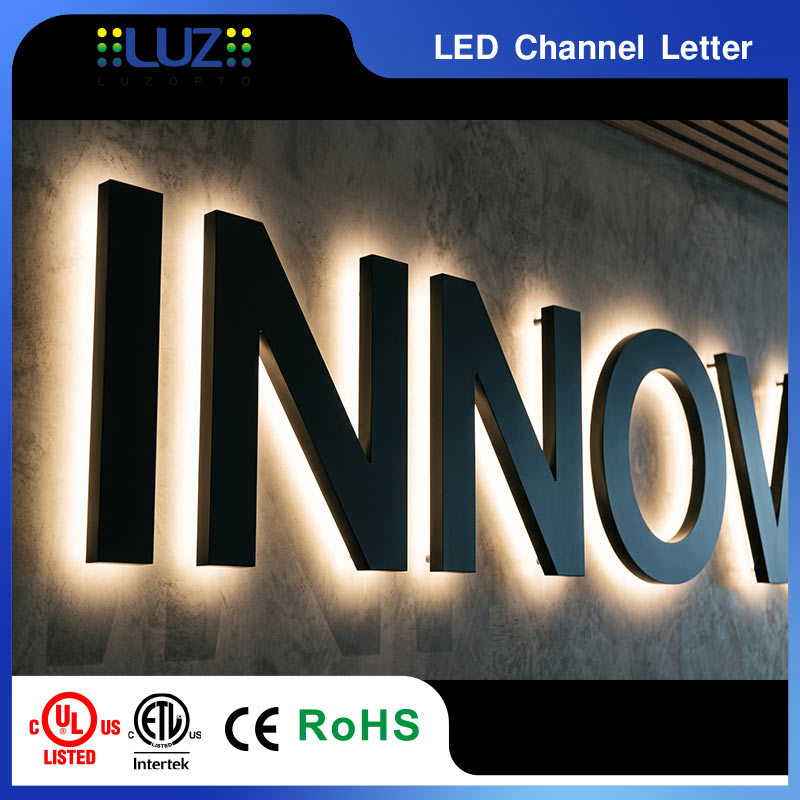 Matt Black Painted Metal Shell Warm White Halo Lit LED Signage With Standoffs For Corporate Office Lobby