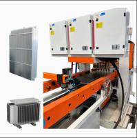 Línea de producción de la aleta del radiador del transformador PLC Panel de control de acero Línea de producción del radiador Alta automatización con servomotores Soldadura de puntos de galería de múltiples cabezas