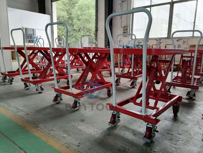 Руководство активированное весной Scissor платформа подъема емкости вагонетки 210kg подъема ручная