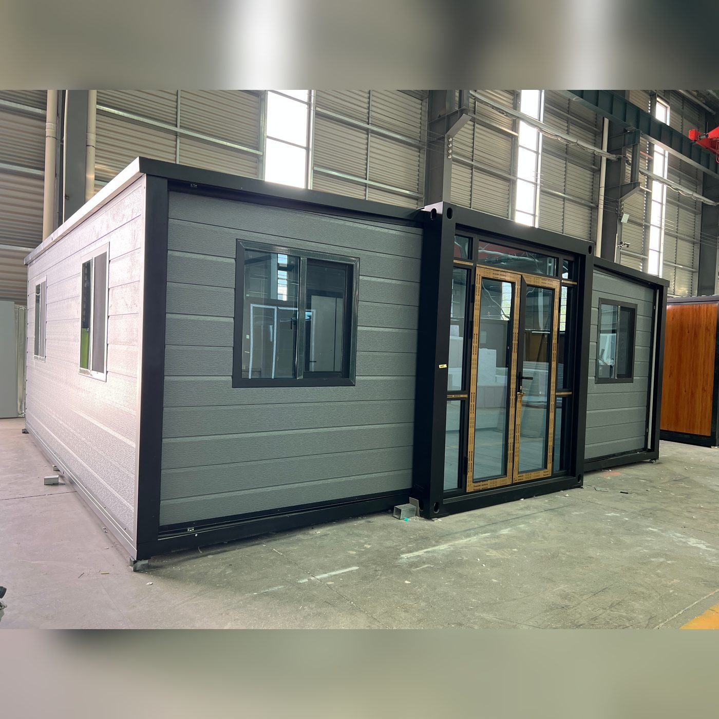 20ft Expandable Container House with Grey Cladding, Black Frame and Fitted Interior