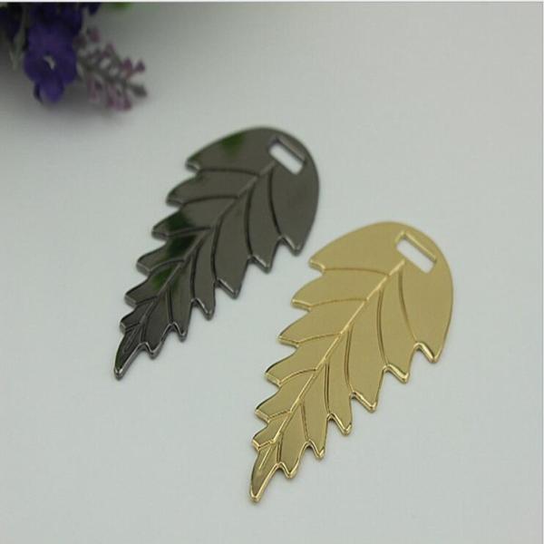 OEM zinc alloy light gold & gunmetal leaf pattern metal logo label tags for handbag/shoes accessories