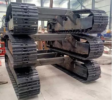 Train d'atterrissage en acier de voie de chenille de construction d'OEM avec le moteur hydraulique de voyage