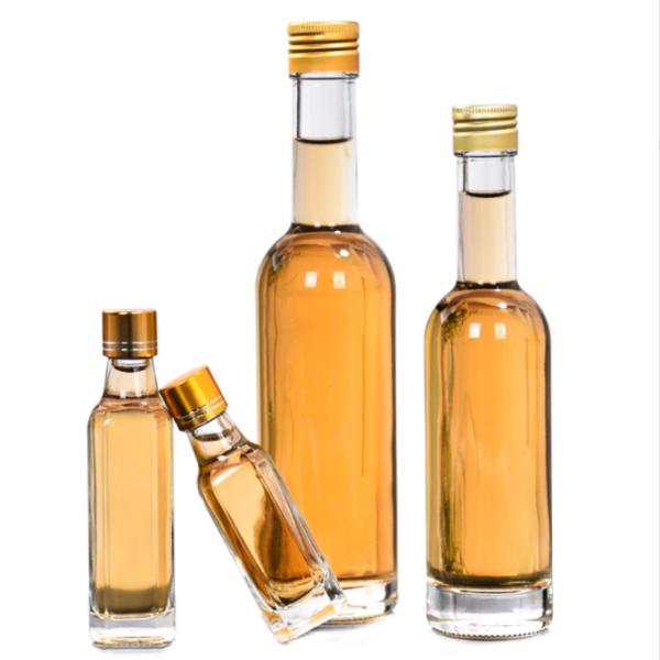 Glass Olive Oil Bottle 100ml 250ml 500ml Round Clear Cooking Oil Bottle with Cap