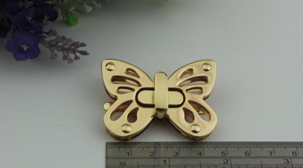 Shiny gold metal zinc alloy butterfly pattern fashion purse turn locks