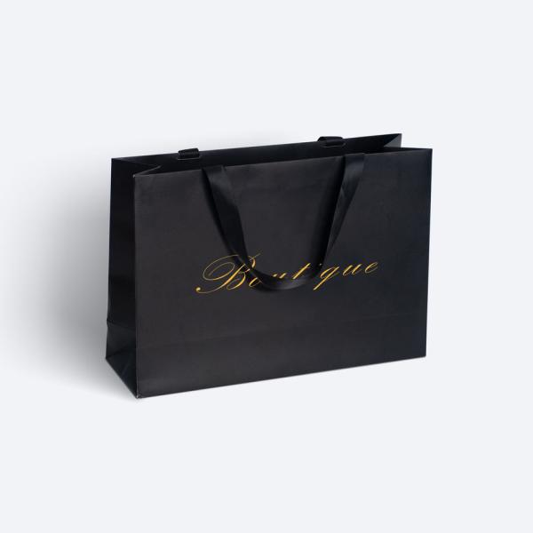 CMYK Bolsa de regalo de compras Partone para diseño personalizado 250 Gsm Art Papel de ropa embalaje