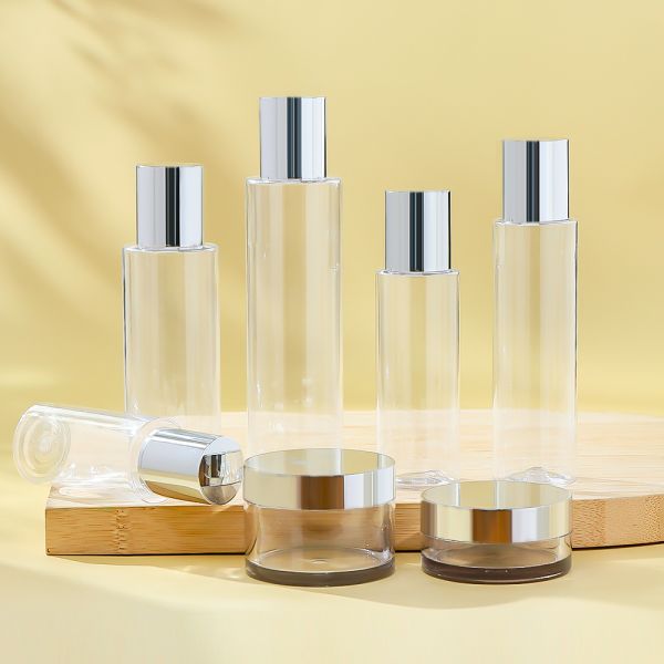 Refillable Cream Jar and Toner Bottle Set with Electroplated Silver Cap and Premium Transparency for Skincare Packaging