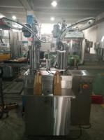 Machine de remplissage semi-automatique de piston