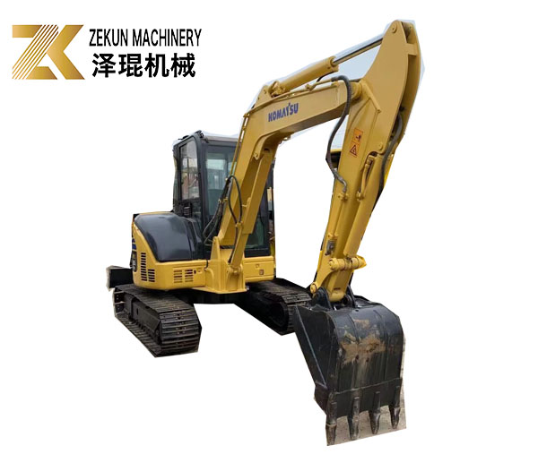 Excavateur Komatsu PC55MR-2 d'occasion avec 28,5 kW de puissance et une capacité de seau de 0,2 m3