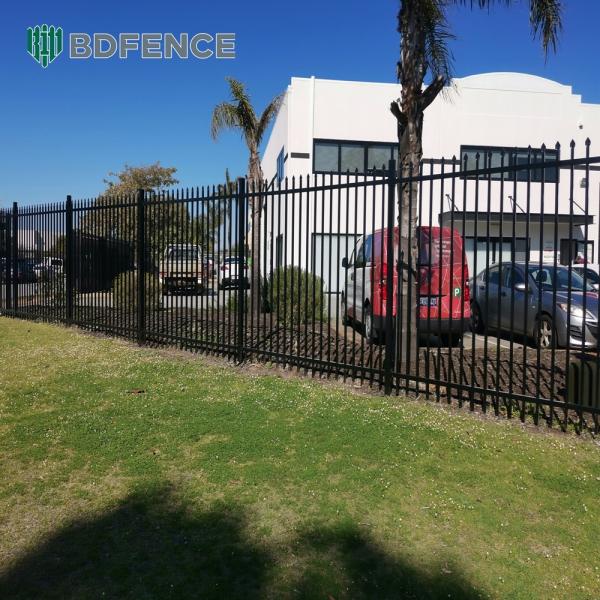 Sleek Tubular Steel Fence Enhances Curb Appeal