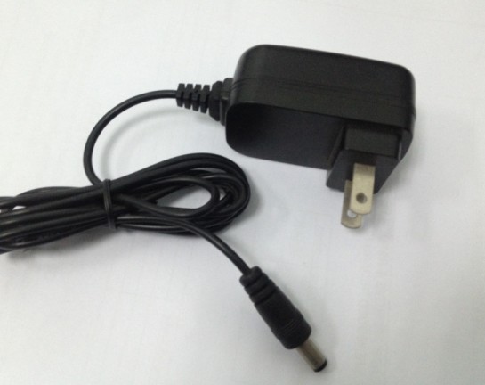swiching power supply 9V 1A charger mall mount adapter
