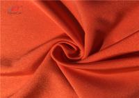 Tela alaranjada semi maçante do Spandex do poliéster da cor para a ioga das caneleiras do roupa interior do roupa de banho