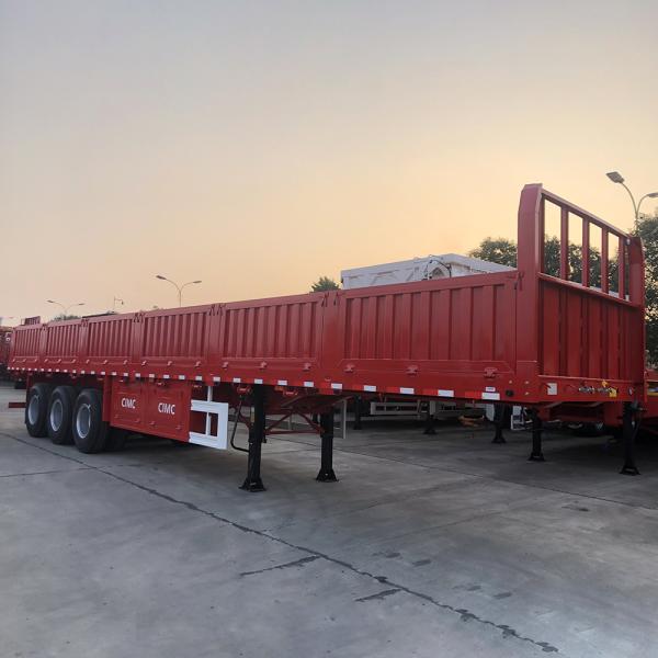 Hot 4 Axles Flatbed Semi Trailer with 1000mm Sidewall Max Payload of 60T 12.00R20 Tire