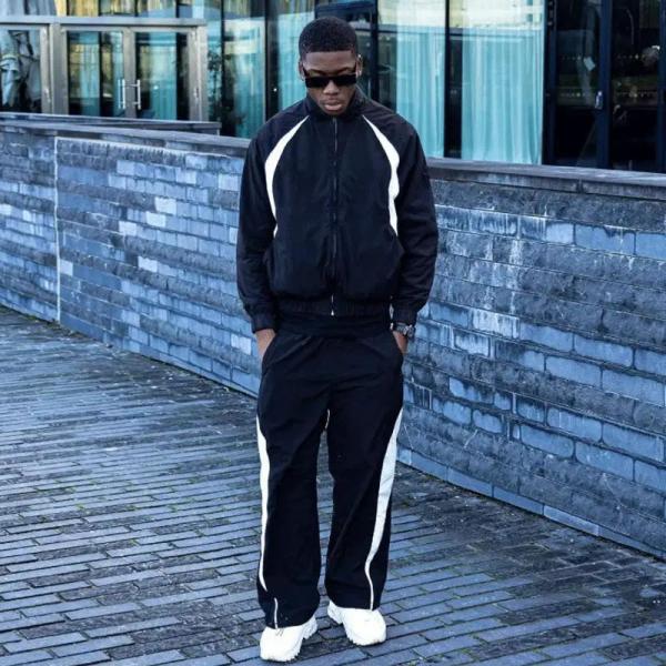 Logo personnalisé surdimensionné Windbreaker Tracksuit en nylon pour homme Sweatsuit antistatique