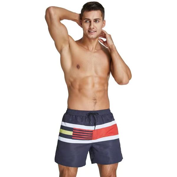Os homens do verão encalham dos homens ocasionais das calças do short do desgaste maiôs curtos