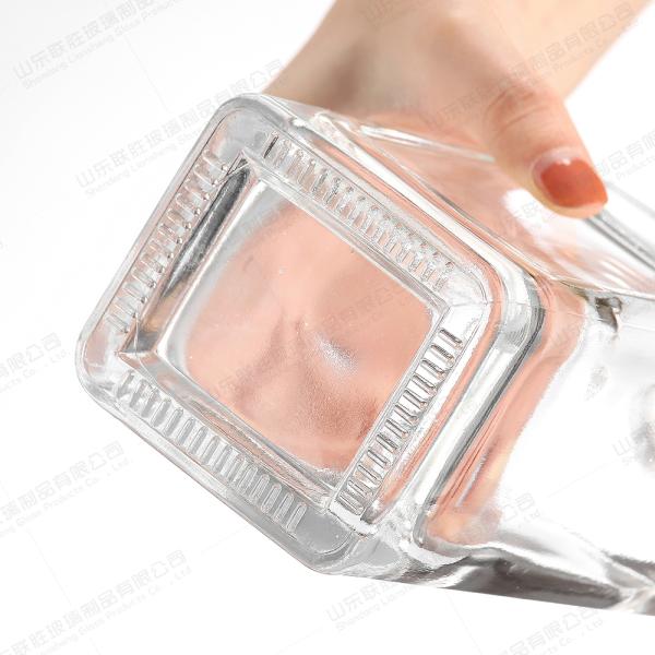 Материал корпуса Стеклянная прозрачная бутылка для ликера текилы 500 мл 1000 мл Уникальная резковая плоская