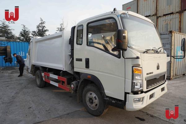 O caminhão leve 3.5T da carga da parte traseira do dever 6CBM recusa o veículo do compressor