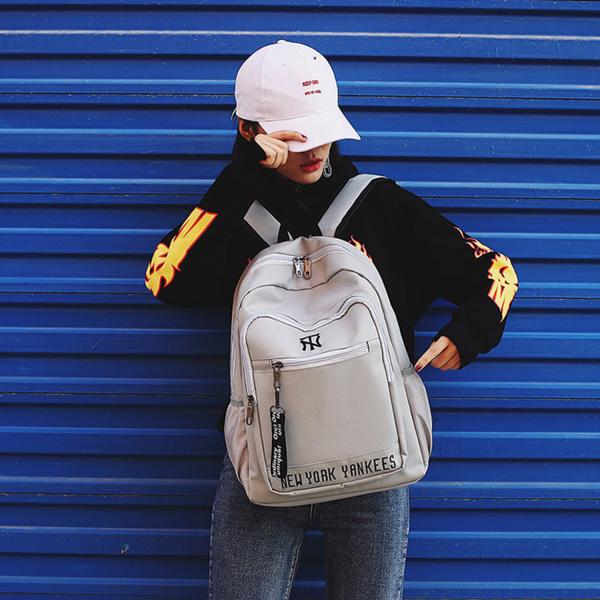 Korean version of cool letters backpack students fashion large capacity schoolbag waterproof casual backpack girl