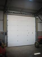 A placa de aço automática exterior em cima isolou a porta de inclinação secional da garagem