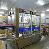 24000BPH Machine d'étiquetage de colle à fusion à chaud Machine d'étiquetage adhésif avec système d'alimentation à plusieurs rouleaux