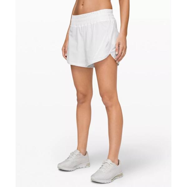 Шорты и разминка женщин идущие замыкают накоротко сторону с карманом молнии для спорт