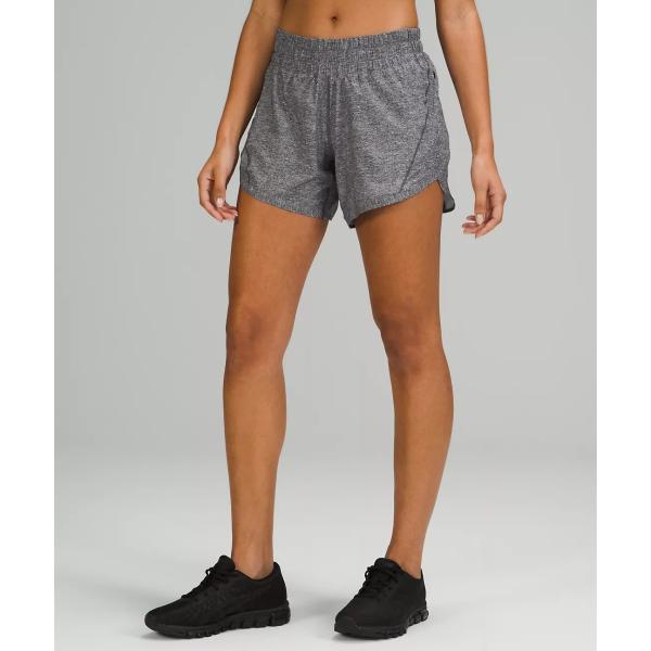 Шорты и разминка женщин идущие замыкают накоротко сторону с карманом молнии для спорт