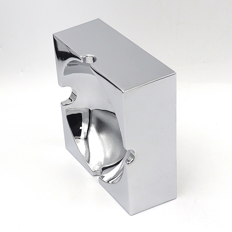 Square polished metal ashtray with glossy mirror surface and multiple notches for stable placement