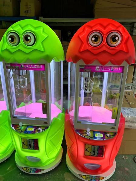 Maquina de juego de muñecas de garra de peluche con monedas Dreamland Máquina de juego de grúa mágica de huevo para la venta