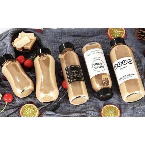 Стеклянная бутылка для напитков современного стиля для простой упаковки напитков