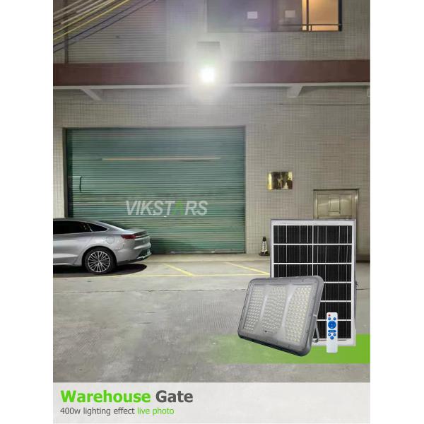 Ventas calientes 100W 200W 300W 400W Luz solar de inundación con PC Lente Iluminación rural exterior IP65 Inmune Iluminación solar de jardín