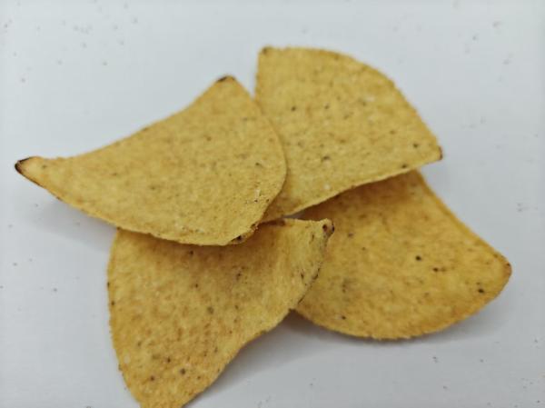 Des chips au maïs au goût de tomate pour les amateurs de collation savoureuse