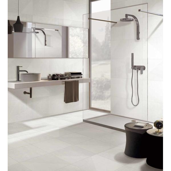 Мрамор плиток фарфора современной стены крытый на открытом воздухе выглядит как серый цвет