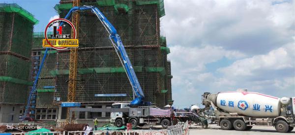 JIUHE 48M Concrete Boom Pumping Truck Machine Concrete Pump Construction Site