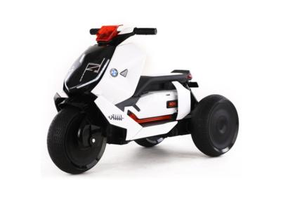 O velomotor elétrico 12v das crianças claras dinâmicas