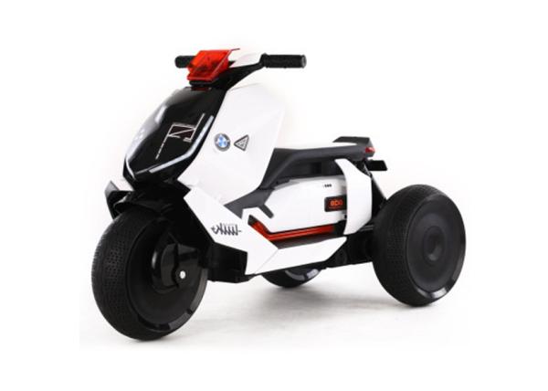 O velomotor elétrico 12v das crianças claras dinâmicas