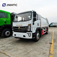 HOWO Collecte de déchets légers Compacteur de déchets Camion prix Dimensions Alimentation automatique