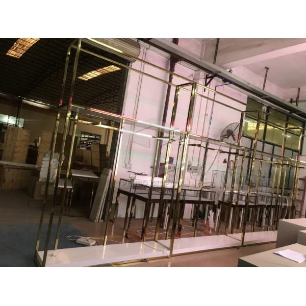 Гальванизируйте стальные выставочные витрины одежды бутика с освещением T5